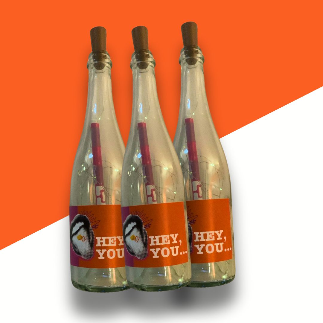 Personal wine tasting voucher - message in a sparkling bottle